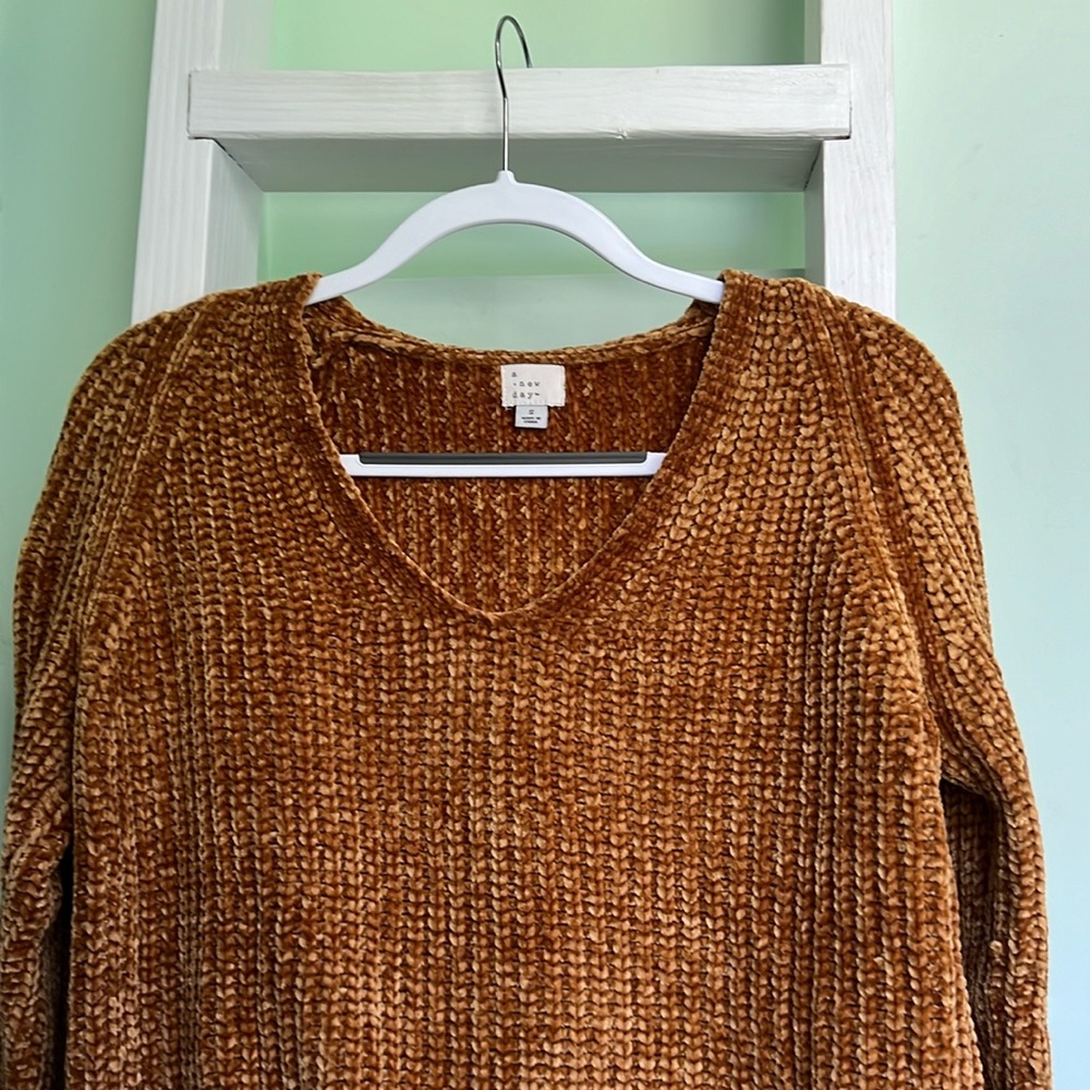 A New Day sweater